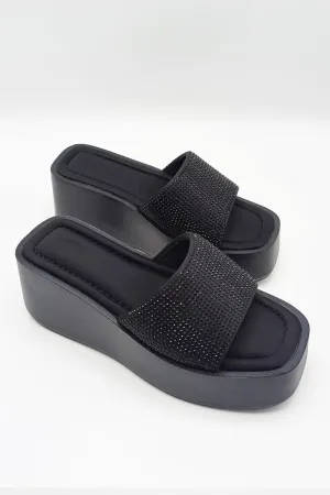 Tahiti Diamante Embellished Strap Wedge Mules in Black